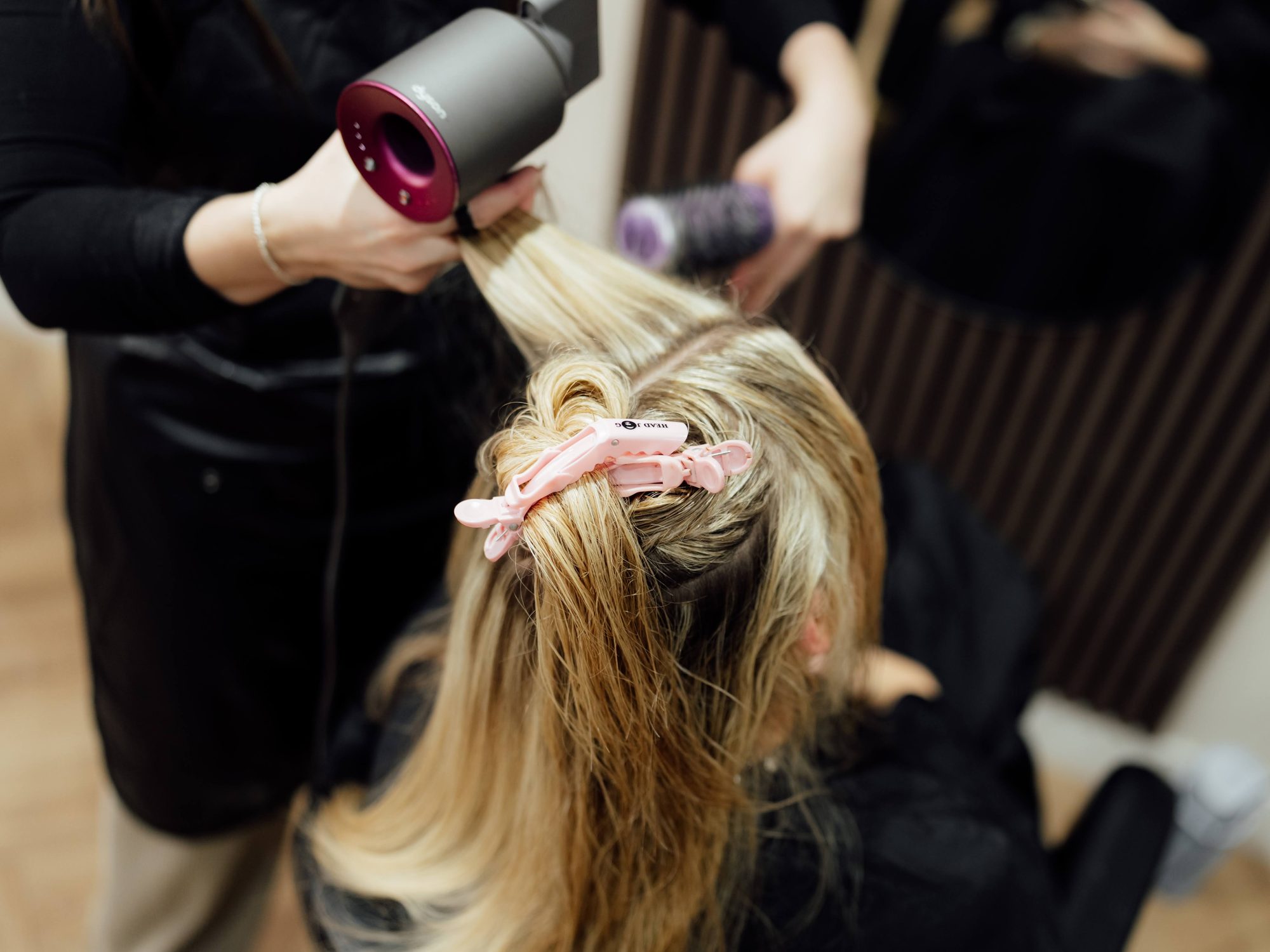 Close up detail shot of hair cutting technique at Lucent Hair