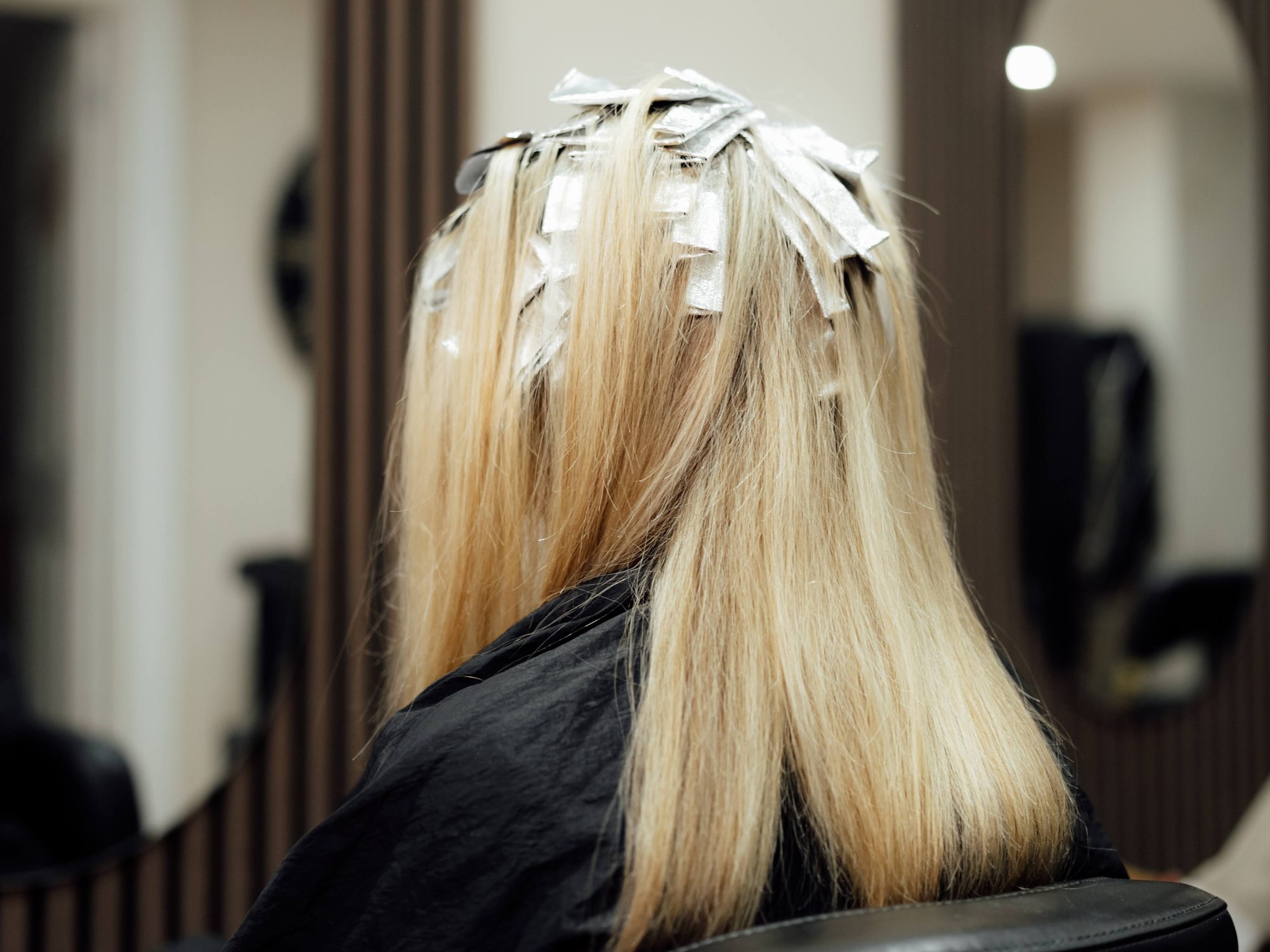 Blonde hair with foil colour highlights applied by Lucent Hair stylist Rebecca
